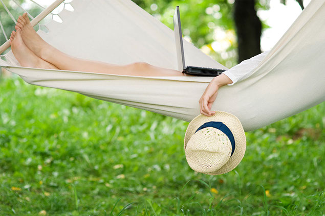 Image of person laying in hammock.