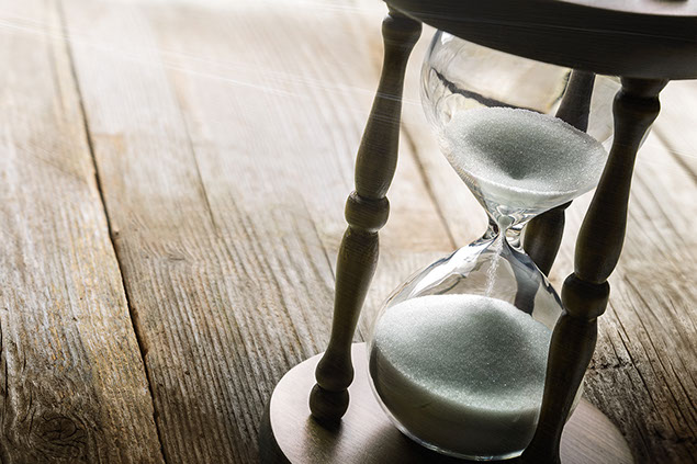 Image of an hourglass measuring the passing of time.