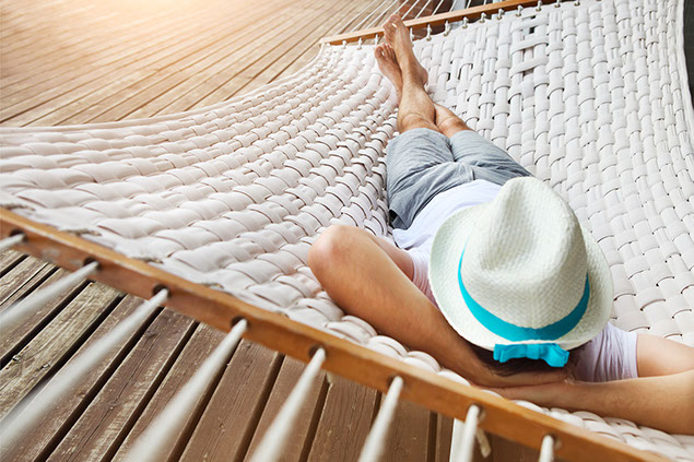 Image of person relaxating in hammock.