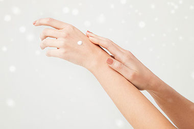 Image of lotion on hand.