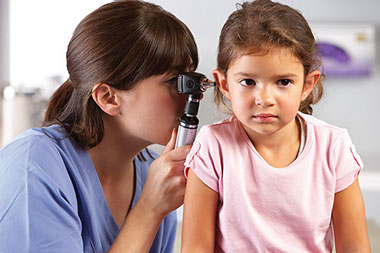 Image of doctor with child patient.