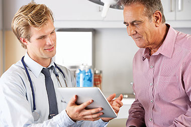 Image of doctor talking to a patient.