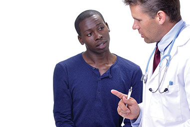 Image of doctor talking to a patient.