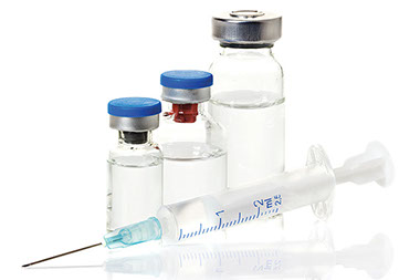Image of a needle and immunizations.