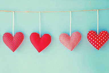 Image of hearts hanging from a string.