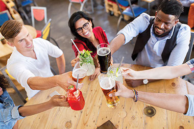 Image of a group of friends drinking.