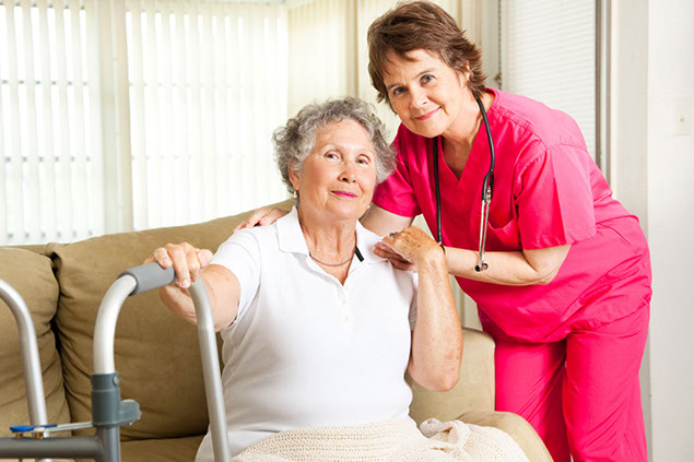 Image of elderyly women and nurse.