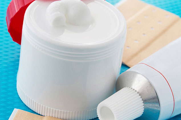 Image of oinment and bandage.