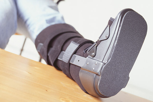 Image of person wearing a foot brace boot.