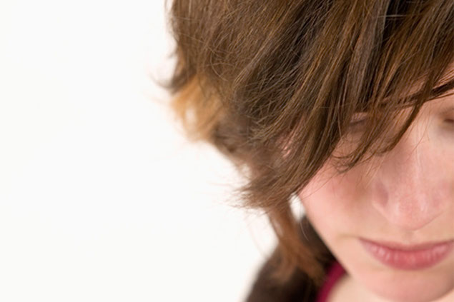 Close up image of womens face.
