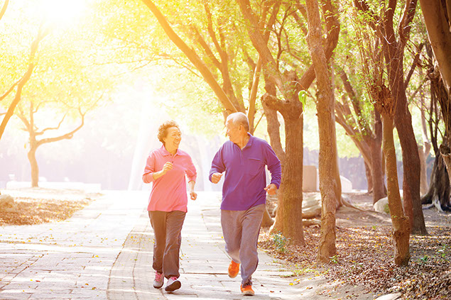 Elderly couple jogging.