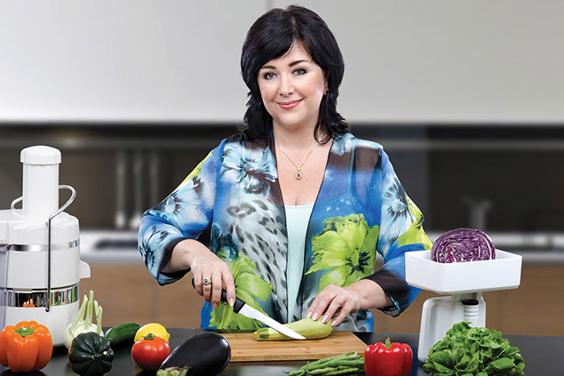 Women cutting vegetables.
