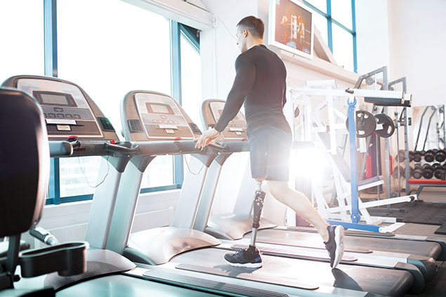 Image of disabled man on treadmill.