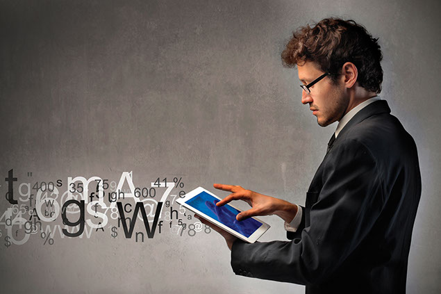 Image of man using a tablet.