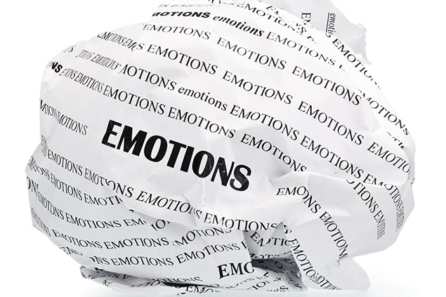 Image of paper balled up with the word 'Emotions' repeated.