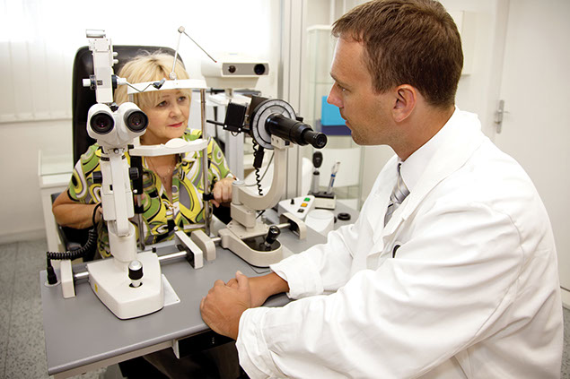 Image of eye doctor and patient.