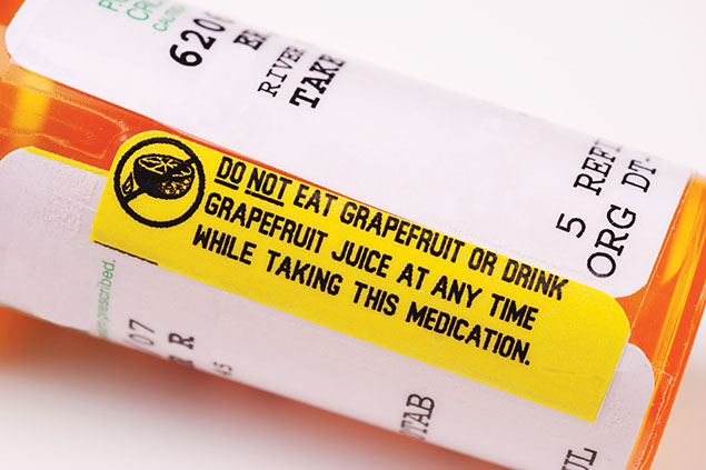 Image of pill bottle with warning about grapefruit.