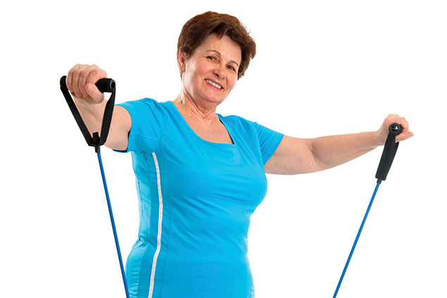 Image of older women with exercise equipment.