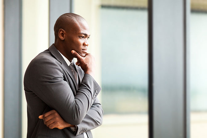 Image of business man thinking.