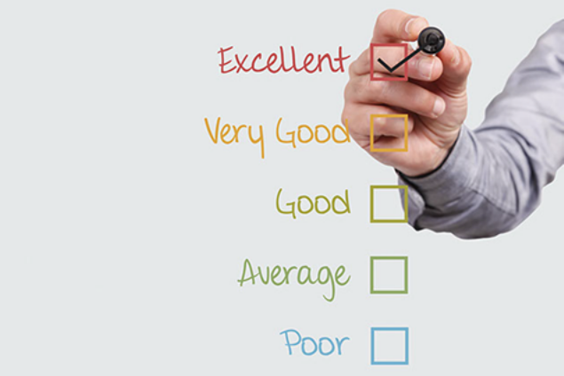 A list of words with a mans hand checking off the "Excellent" box.