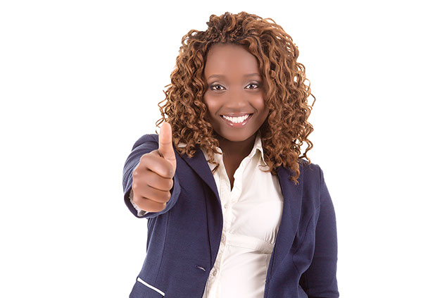 Image of young women with thumbs up.