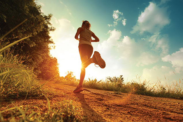 Low angle image of women running.