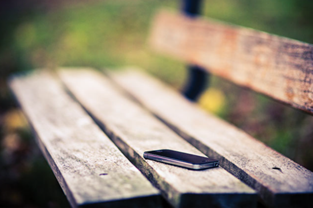 Image of a smart phone on a bench.