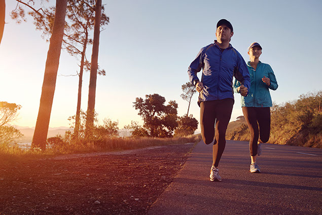 Image of couple running.