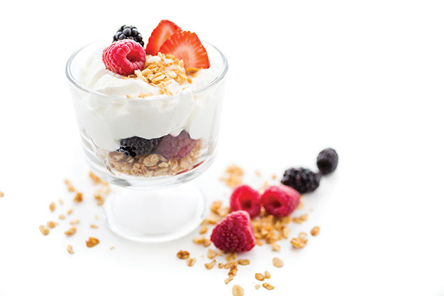 Image of greek yogurt and fresh berries.