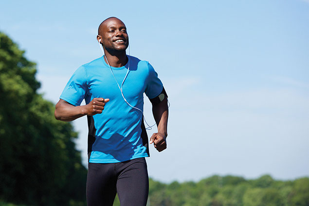 Image of man running while listening to music.