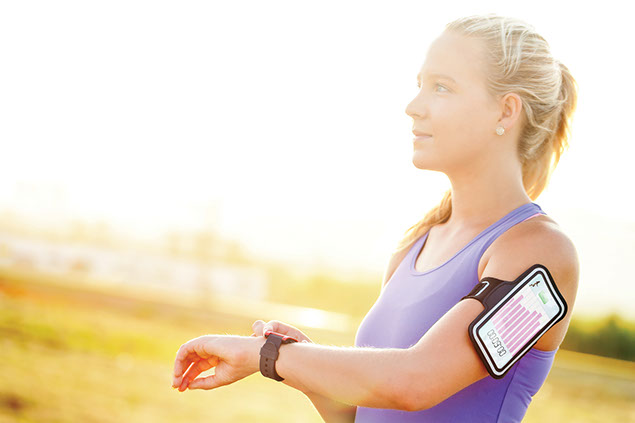 Image of women with a fitness tracker.