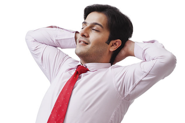 Image of business man deep breathing.