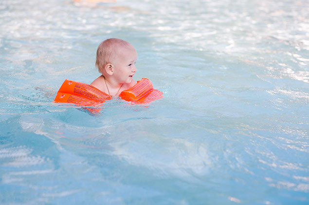 Image of toddler swimming.