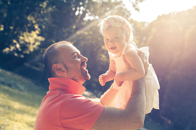 Image of father and young daughter.