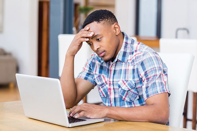 Image of man using computer.