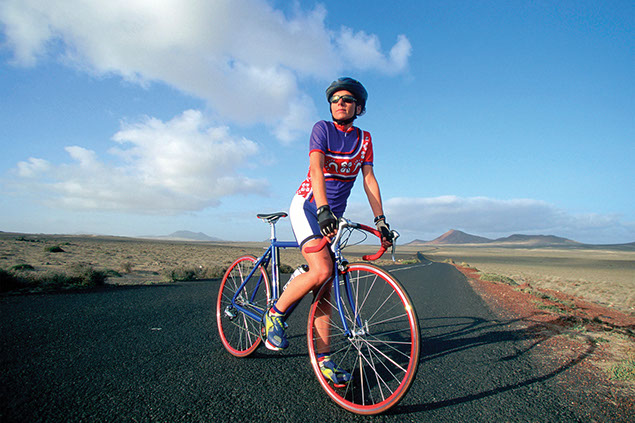 Image of women on bike.