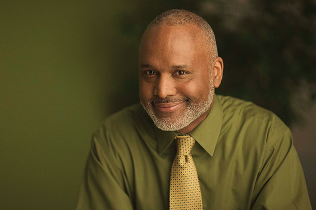 Image of business man smiling.
