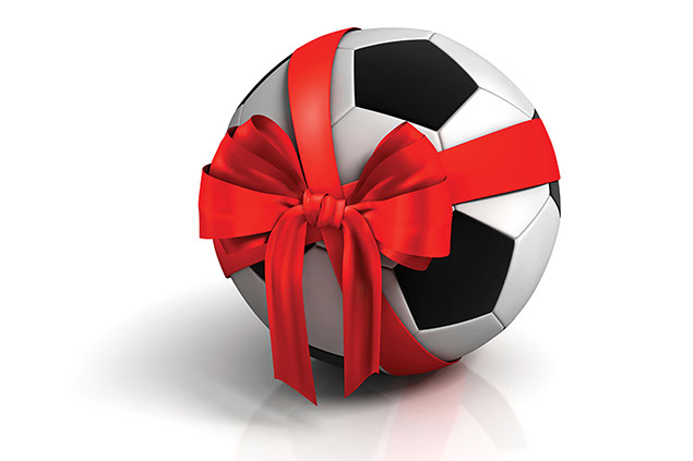 Image of soccer ball with ribbon around it.
