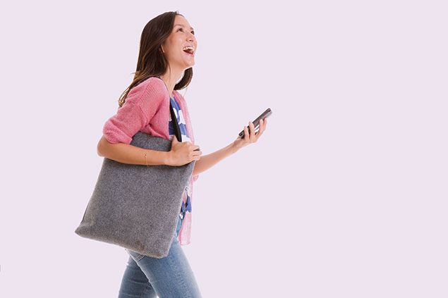 Women walking and talking on the phone.