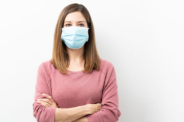 Women wearing a face mask.