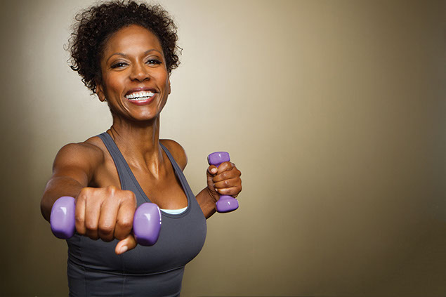 Women using weights.