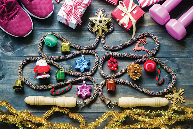 Jump roap shaped into a christmas tree with ornaments and fitness gear.