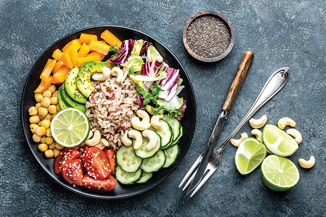 Bowl of vegetables with rice and chickpeas.