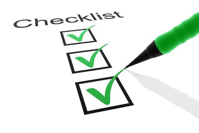Image of green pen checking off boxes.