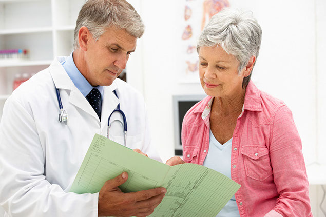 Image of doctor and patient talking.
