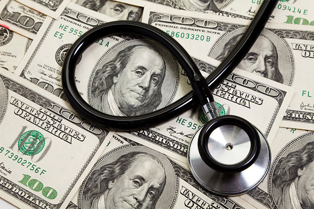 Image of money with a stethoscope.