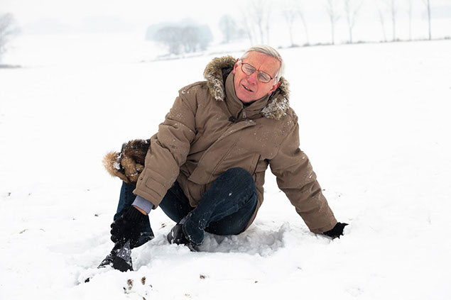 Image of older man who fell on snow.