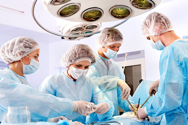 Image of doctors performing surgery.