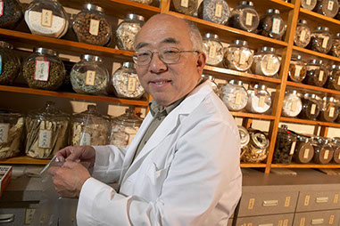Image of man at herb store.