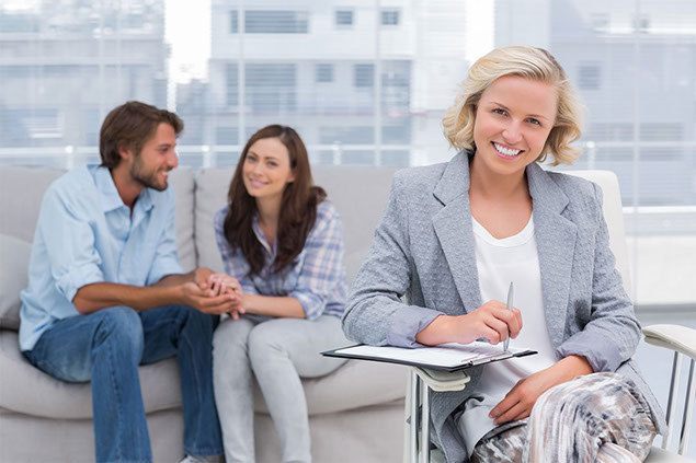 Image of couple with counselor.